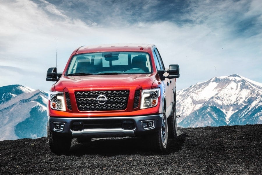Nissan Titan driving on a mountain top.