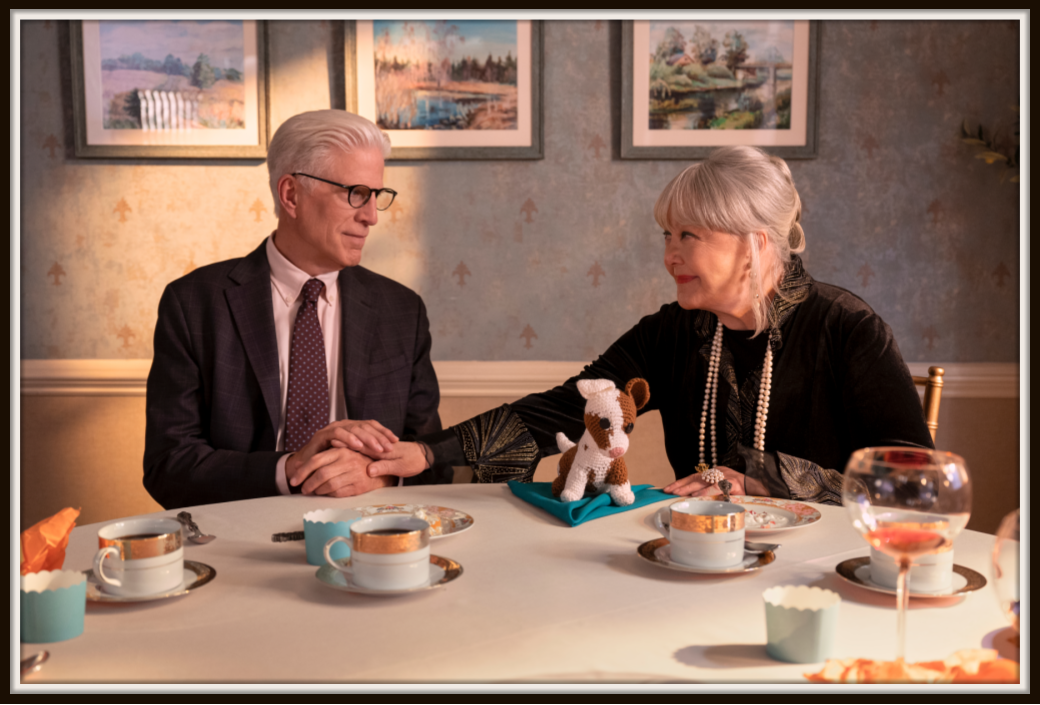 Cast members from A Man on the Inside share a touching scene in this intimate moment between characters, showcasing the strong performances of Ted Danson and Kathy Bates. Their chemistry adds depth to the series, offering viewers an engaging experience.