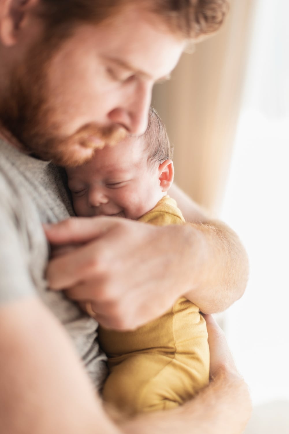 Close-up father with his baby, Dads Get For Paternity Leave