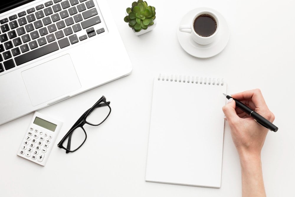 Close-up hand holding pen