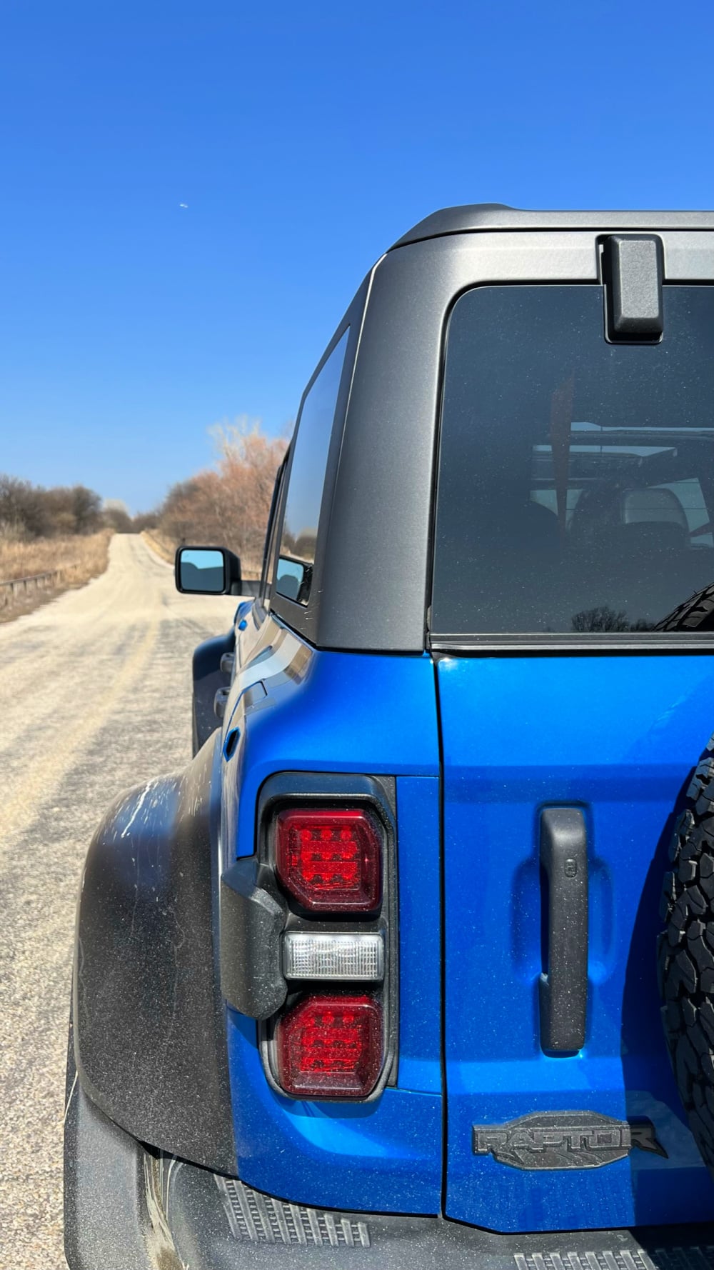 Long dirt road ford Bronco Raptor