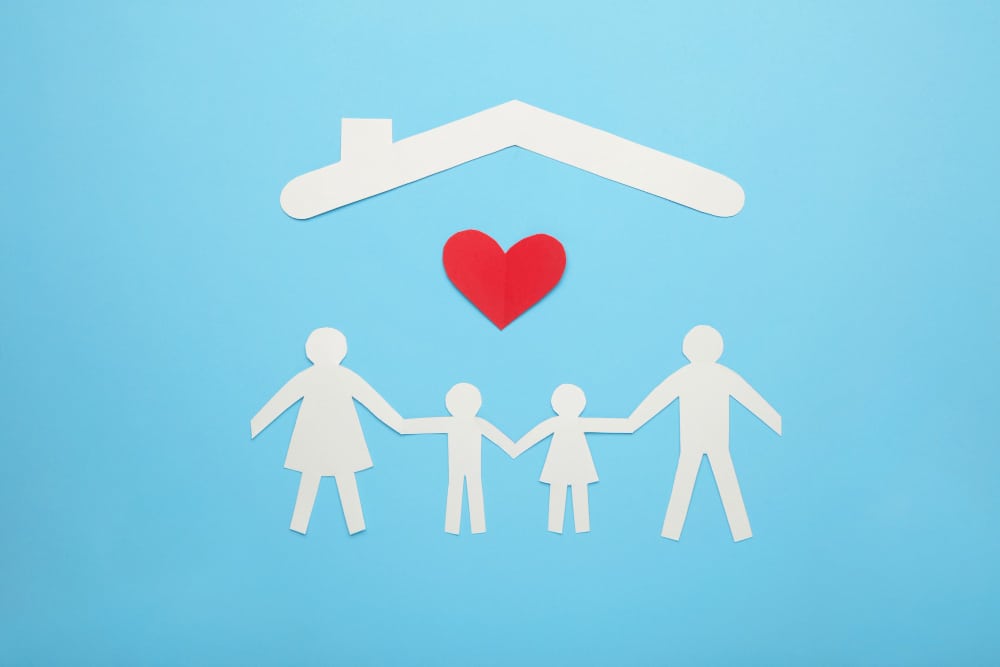 Family of four covered b roof