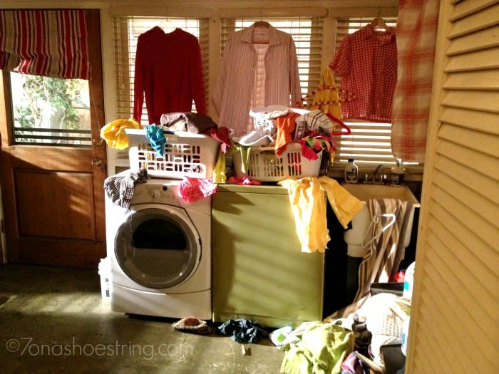 On set of the middle cast house, Frankie Heck messy laundry room