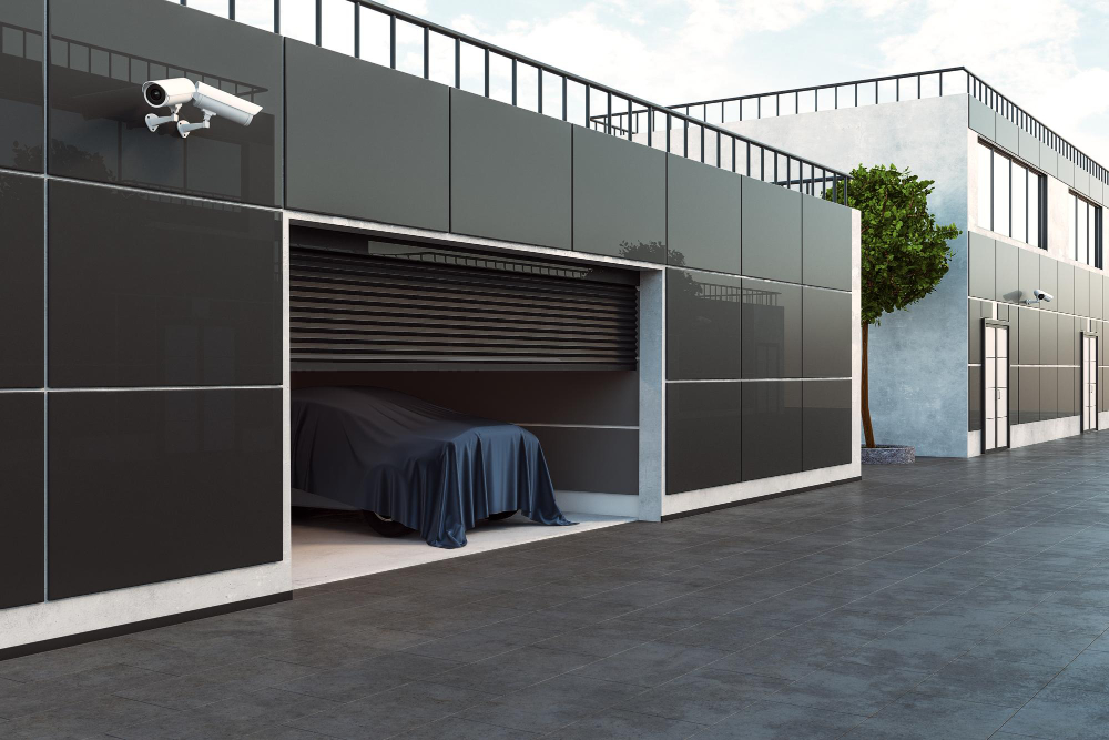 Modern garage with CCTV security camera and a car under cover