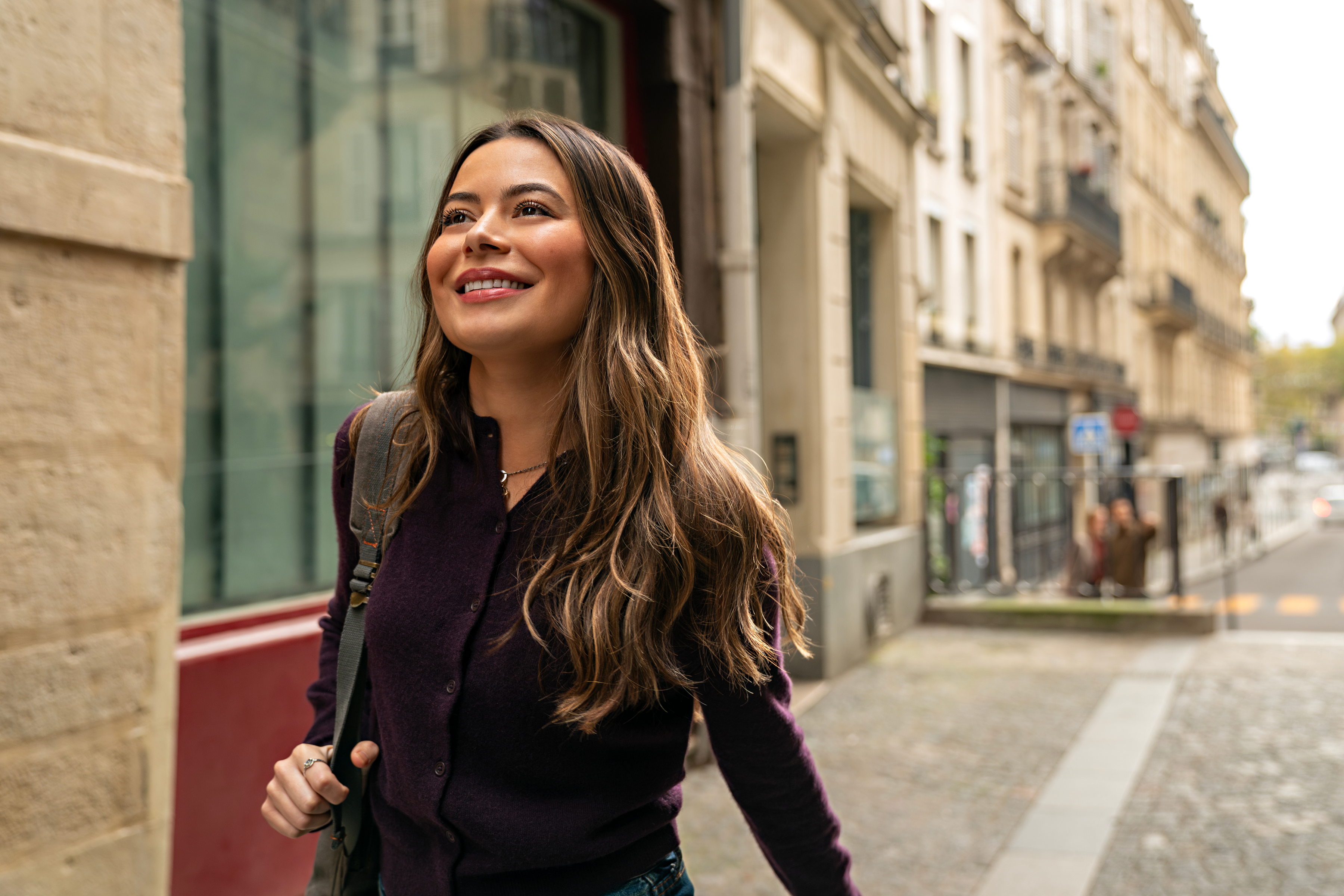 Miranda Cosgrove as Dawn walking along a Paris street in The Wrong Paris.