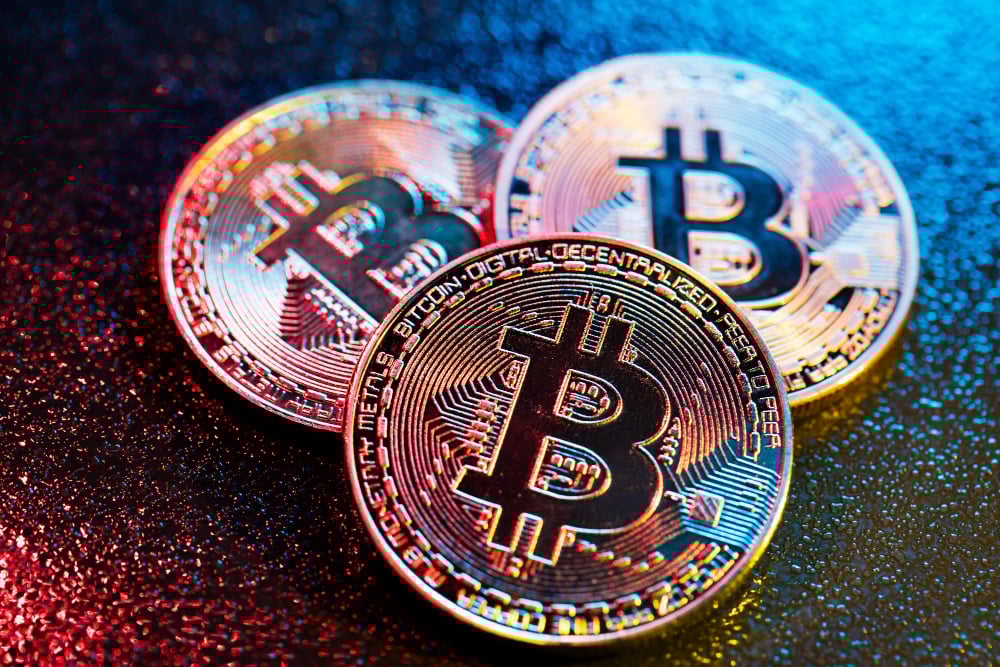 bitcoin coins in a colorful lighting cryptocurrency and cryptography virtual currency