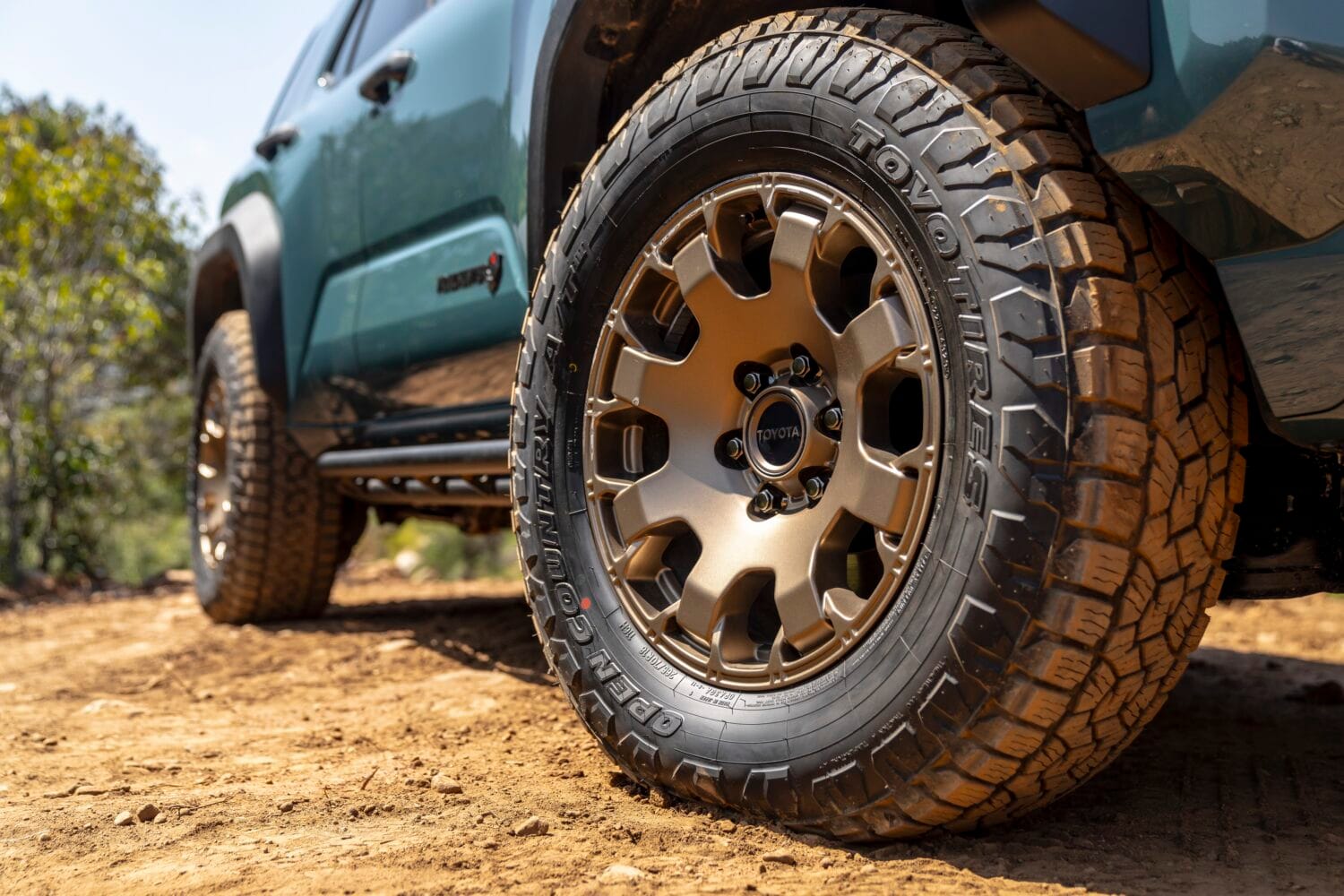 Bronze alloy wheel and Toyo all-terrain tire on the 2026 Toyota 4Runner Trailhunter designed for rugged trails.