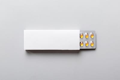 Blank white product package box mockup open blank medicine drug box with omega blister top view