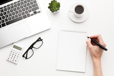 Close-up hand holding pen