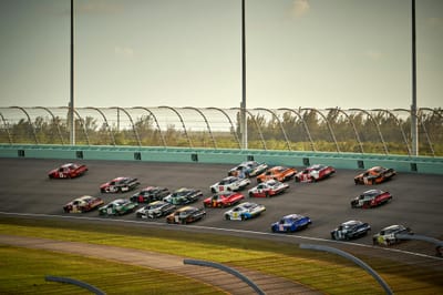 NASCAR Cars Racing on a Track