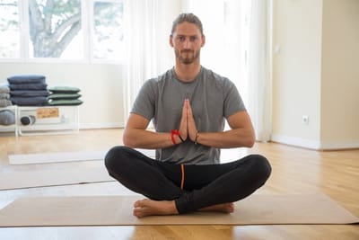 Young male doing yoga