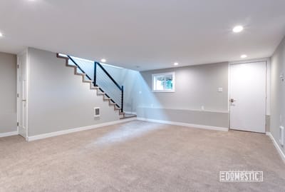 Light spacious basement area with staircase