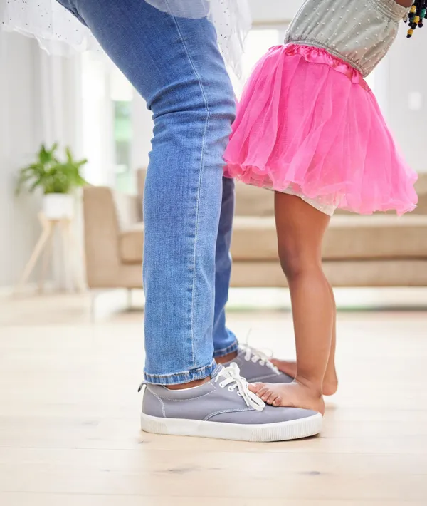 Father and daughter sharing a tender moment at home, symbolizing love, stability, and custody readiness.