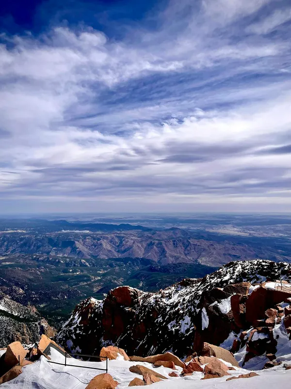 Majestic view of snow-capped peaks and expansive landscape in Colorado, USA.