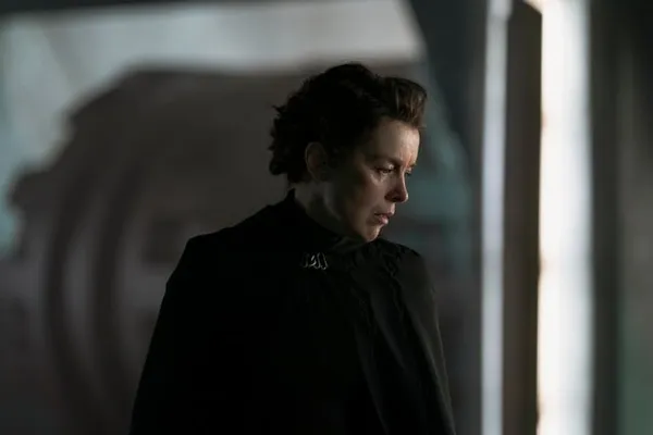 Olivia Williams as Tula Harkonnen, appearing in a moment of deep thought or inner conflict. The moody lighting and shadowed b