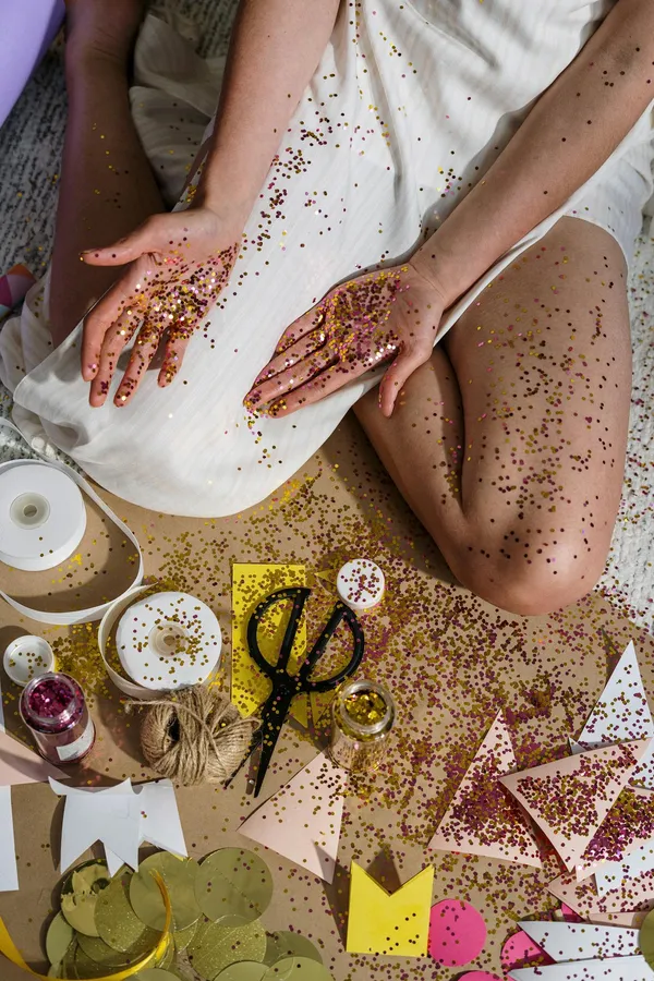 Woman in White Sleeveless Dress Holding Sliced Bread