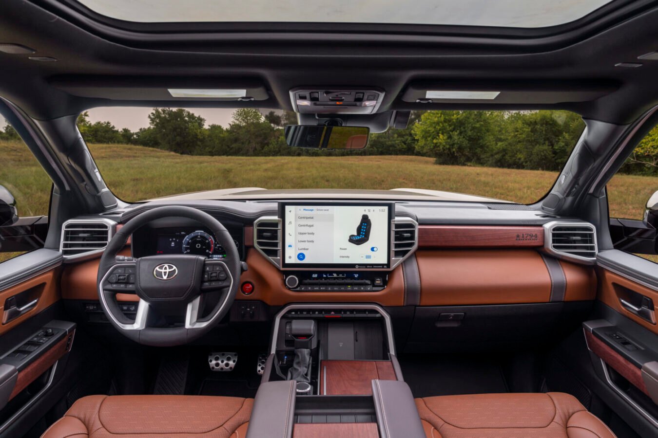 2025 Toyota Sequoia 1794 interior dashboard view with a 14-inch touchscreen, massaging seats, and JBL premium sound system.